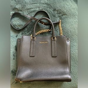 Michael Kors Black, pebble leather top handle bag.
